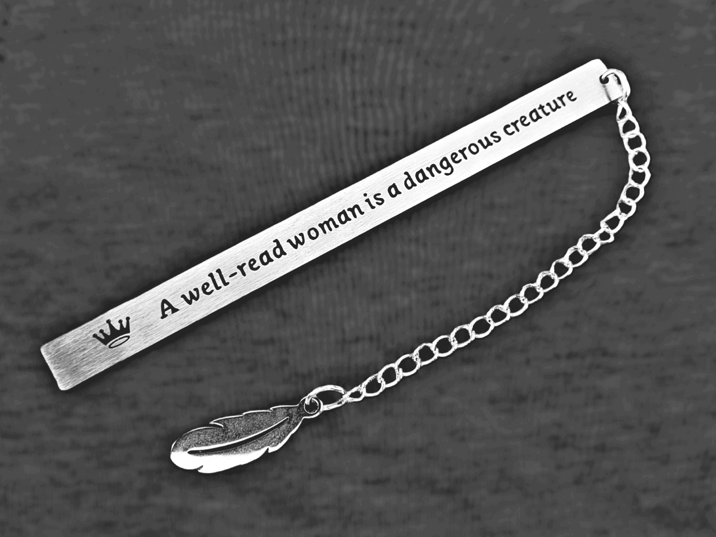 Silver Bookmark - A well read woman is a dangerous creature.